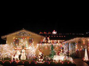 Image of house decorated with a large number of Christmas lights and decorations